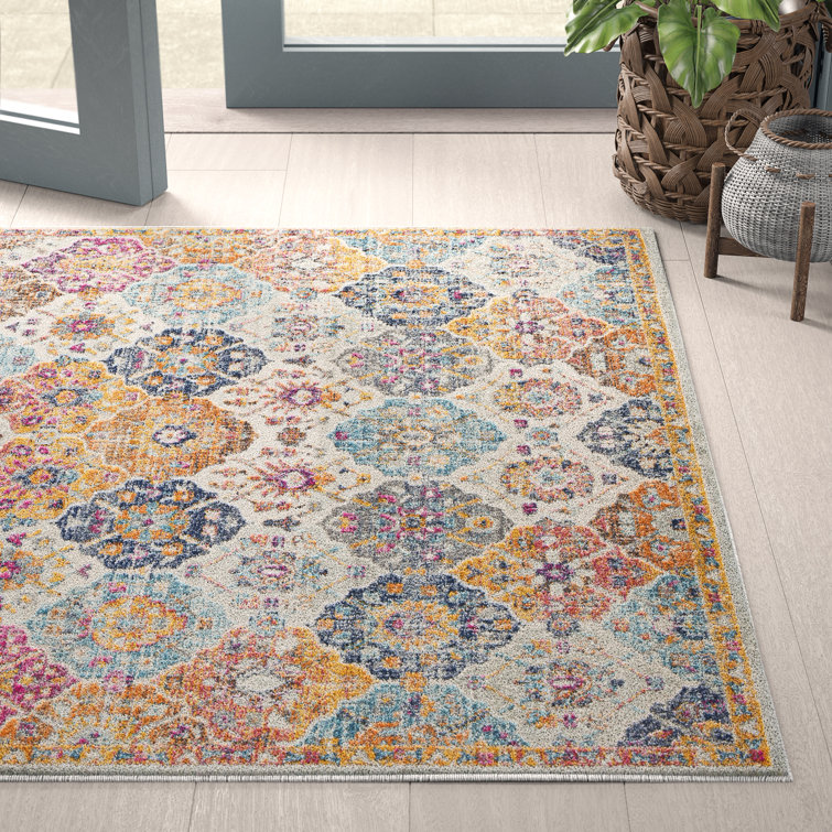 Mistana™ Hillsby Oriental Area Rug in Saffron/Burnt
